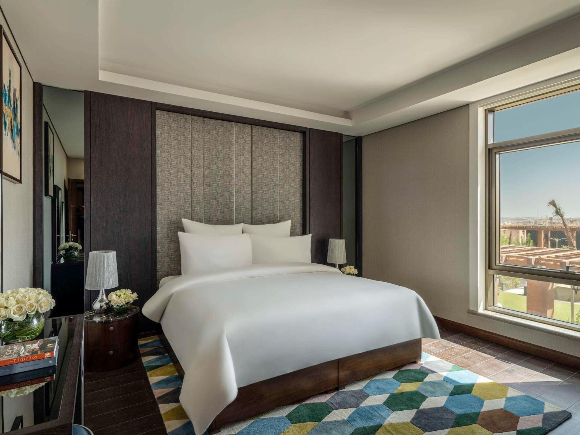 Movenpick Hotel And Residences Riaad Buitenkant foto A bedroom at the hotel